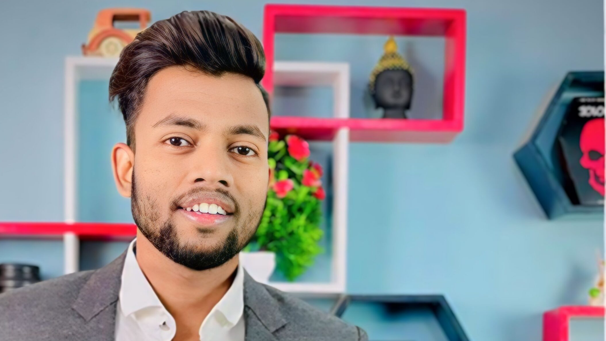 Manoj Dev seated in his workspace, reflecting his journey to financial success as a YouTuber.